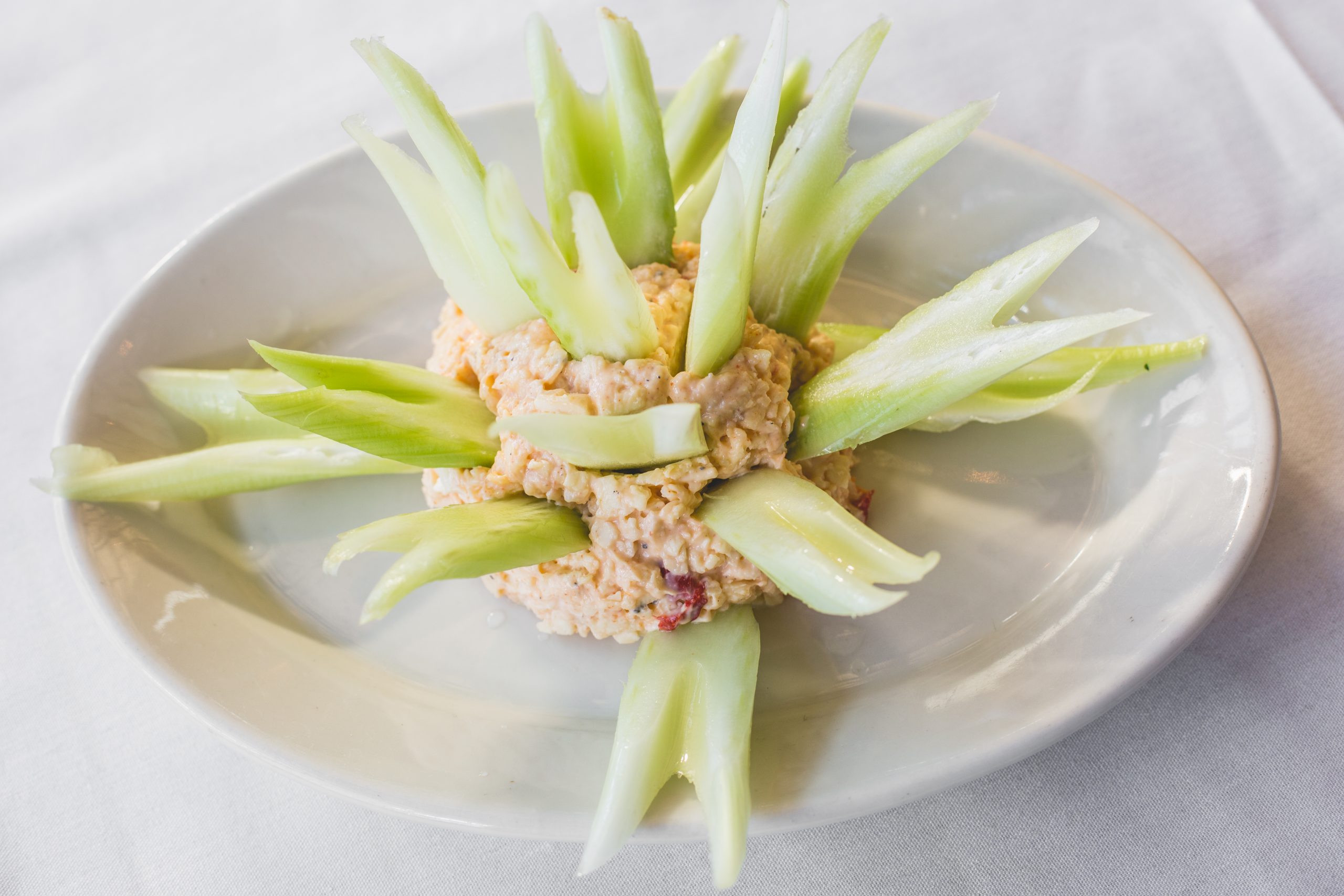 Roadhouse Pimento Cheese in a Ball with Celery Scoop Crown