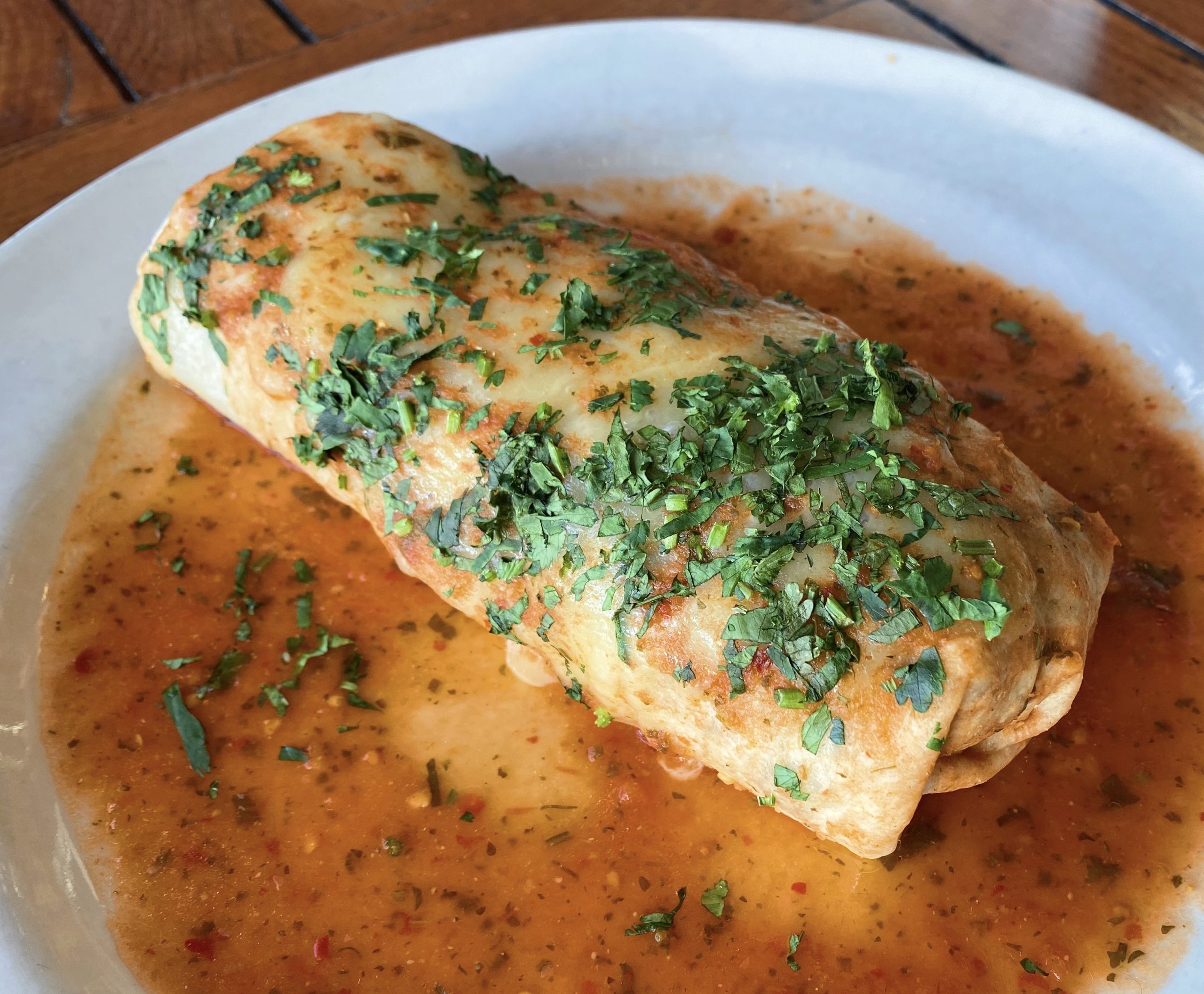 The Roadhouse Smothered Breakfast Burrito Blue Plate