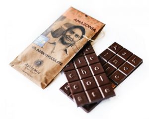 zamora_amazonia-2019 An Askinosie chocolate bar next to it's wrapper.
