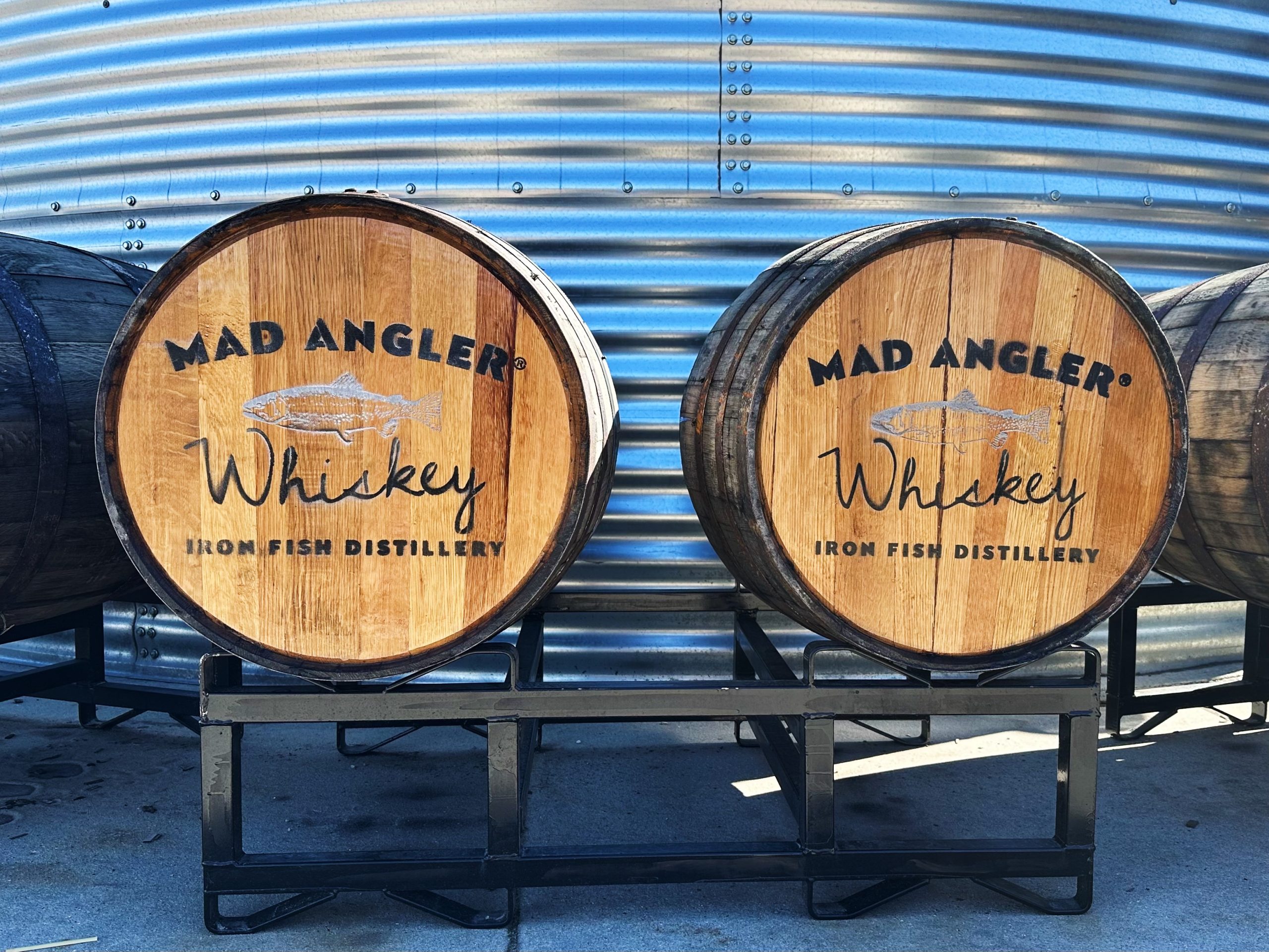 Two barrels of Iron Fish Mad Angler whiskey